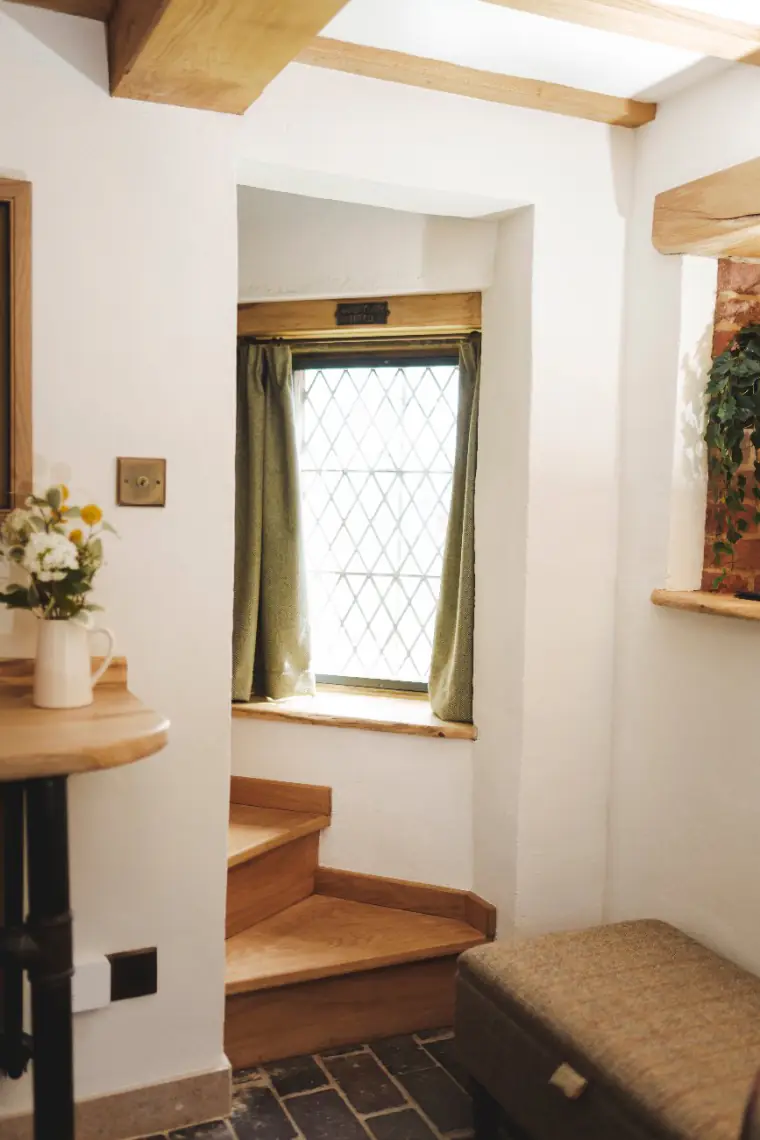 Leaded window looking onto the garden